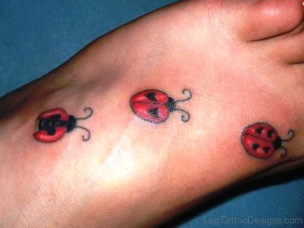 3 Ladybug Tattoos On Foot
