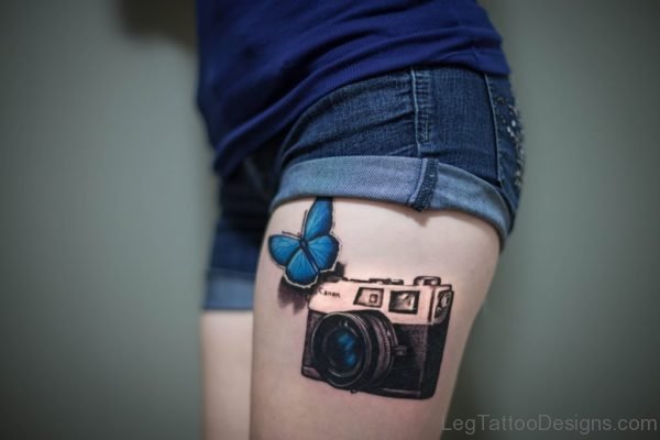 3D Butterfly And Canon Camera Tattoo On Thigh