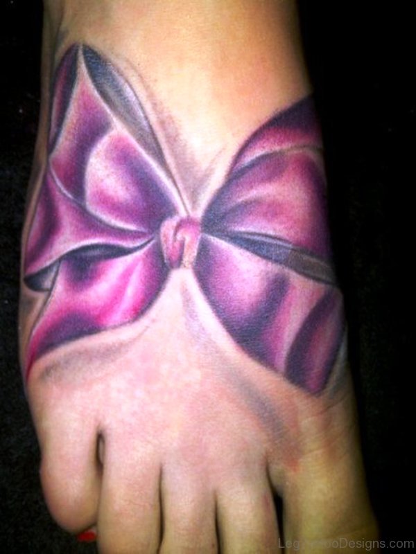Abstract Bow Tattoo On Foot