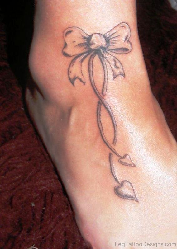 Adorable Bow Tattoo On Foot