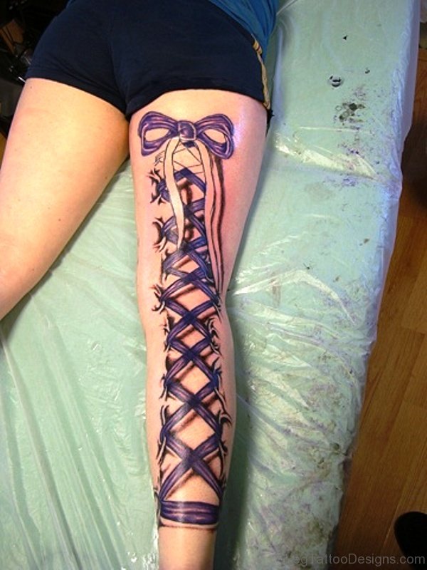 Adorable Corset Tattoo On Leg