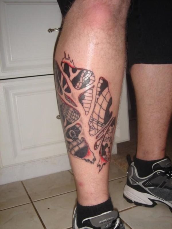 Amazing Biomechanical Tattoo On Leg Image