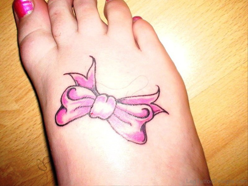 Amazing Pink Bow Tattoo On Foot