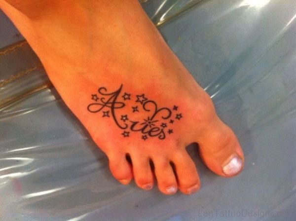 Aries Lettering Tattoo On Foot