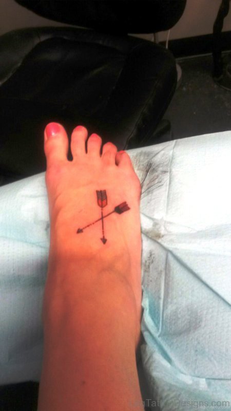 Arrow Tattoo On Foot With Red Feather