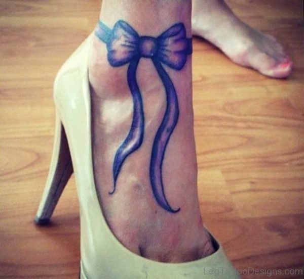 Attractive Blue Ribbon Bow Tattoo On Ankle
