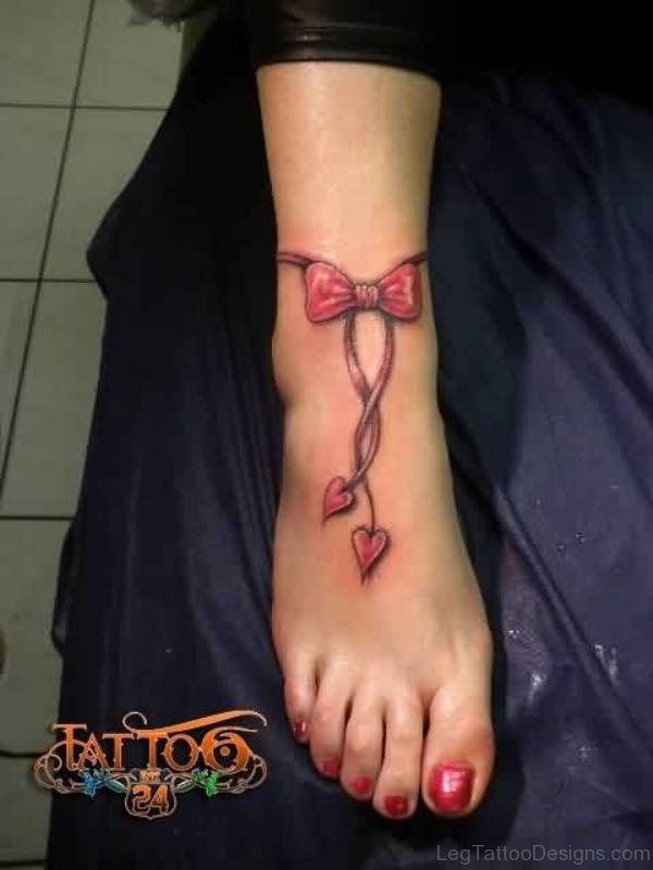 Attractive Red Bow Ribbow Tattoo