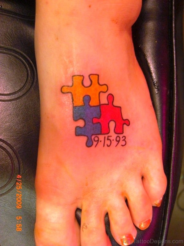 Autism Memorable Puzzle Tattoo On Foot