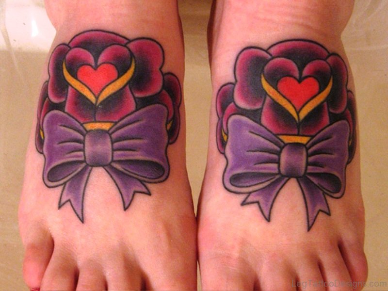 Beautiful Bow Tattoo With Heart Design