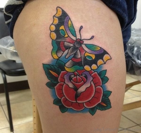 Beautiful Rose With Butterfly Tattoo On Thigh