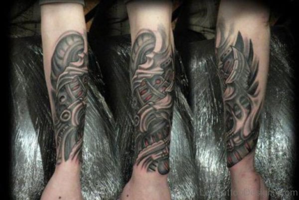 Biomechanical Tattoo Design On Lower Leg