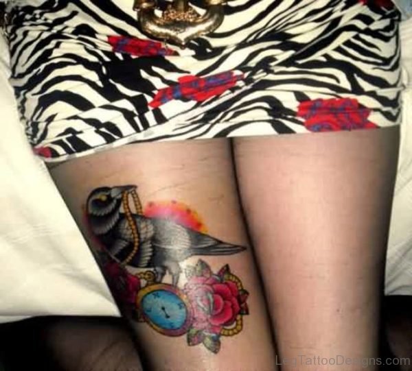 Bird With Clock Tattoo On Thigh