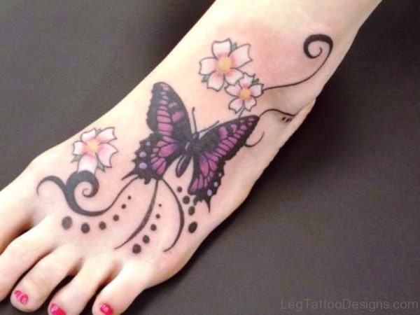 Black And Pink Butterfly Tattoo On Foot