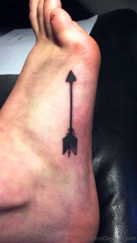 Black Arrow Tattoo Design On Foot
