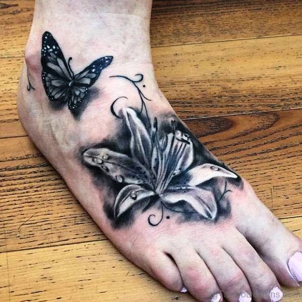 Black Butterfly With Flower Tattoo On Foot