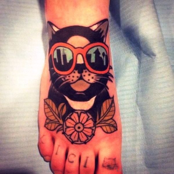 Black Cat With Flower Tattoo On Foot