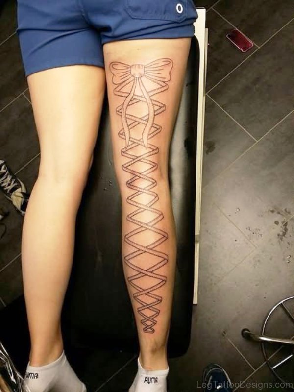 Black Corset Outline Tattoo On Leg