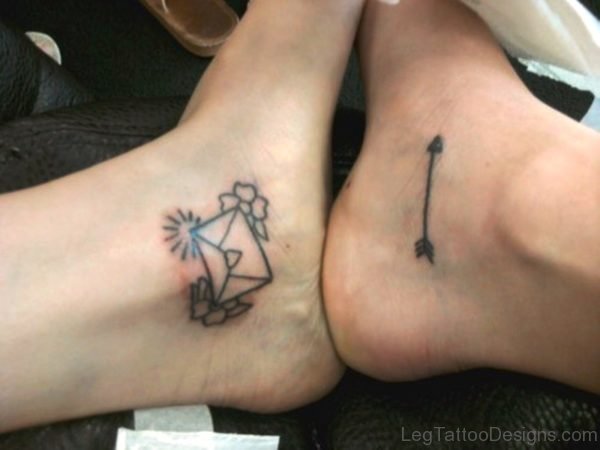 Black Ink Arrow Tattoo On Foot