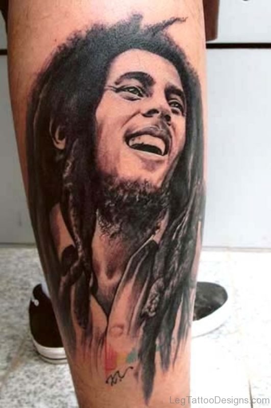 Black Ink Bob Marley Portrait Tattoo On Leg