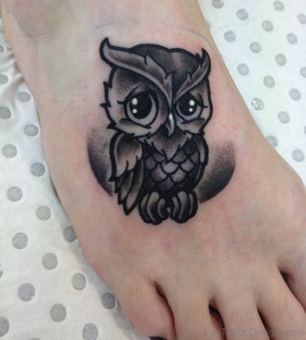 Black Ink Owl Tattoo On Foot