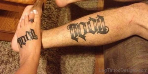 Black Ink Todd Ambigram Tattoo On Leg And Foot