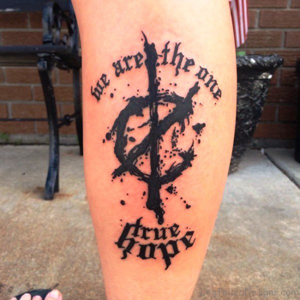 Black Inked Wording Tattoo On Calf