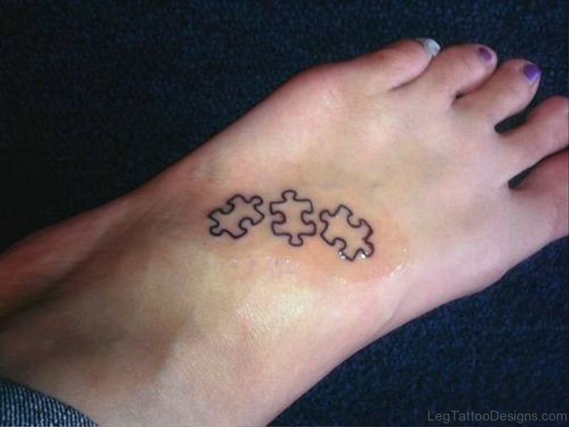 Black Outline Autism Tattoo On Foot