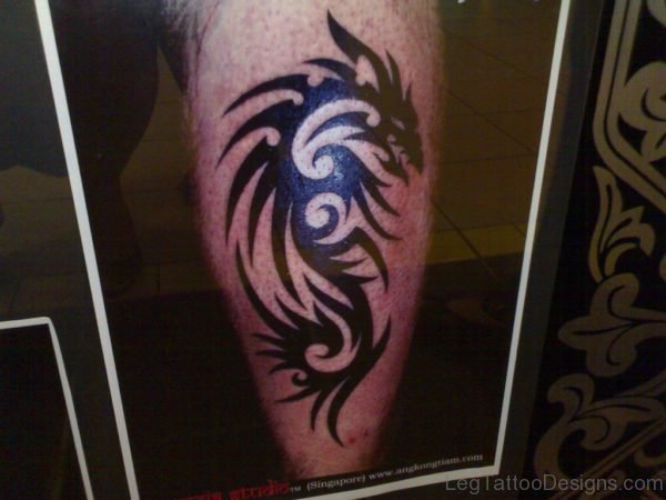 Black Tribal Dragon Tattoo On Leg Calf
