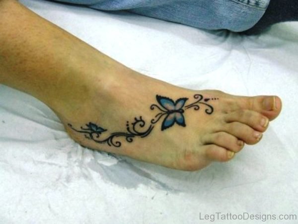 Blue Butterfly Tattoo On Foot
