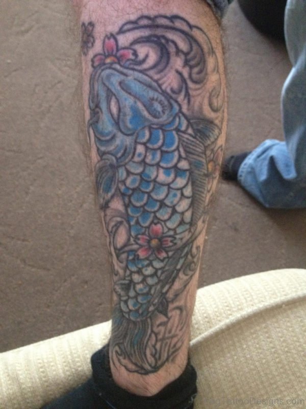 Blue Koi Carp tattoo on left leg