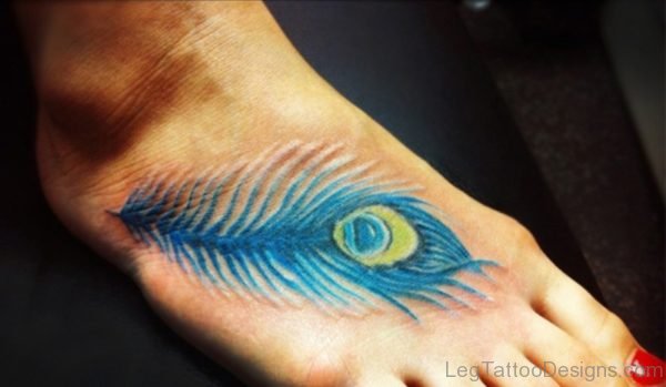 Blue Peacock Feather Tattoo On Foot