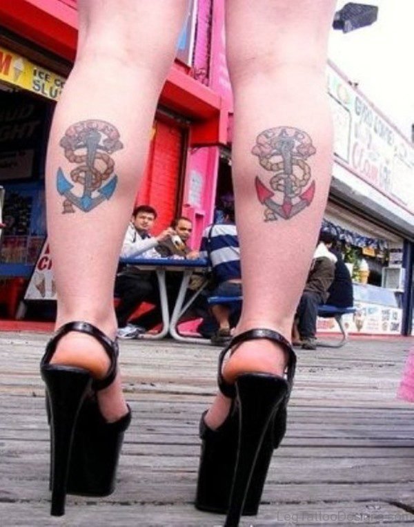 Blue Red Anchor Tattoo On Leg