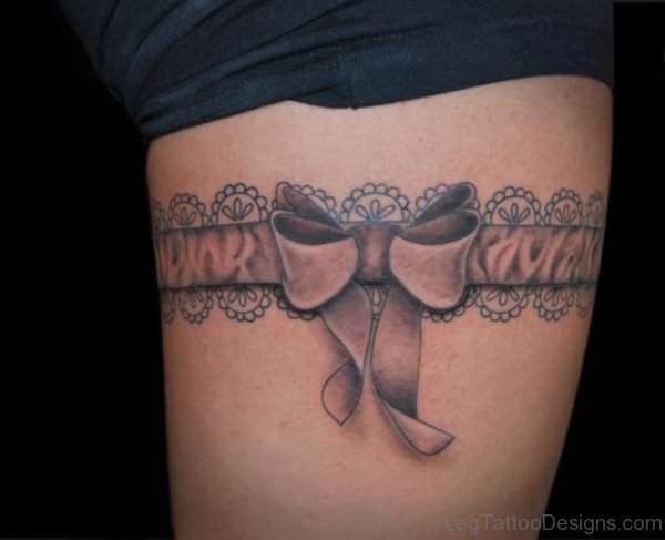 Brown BowThigh Tattoo