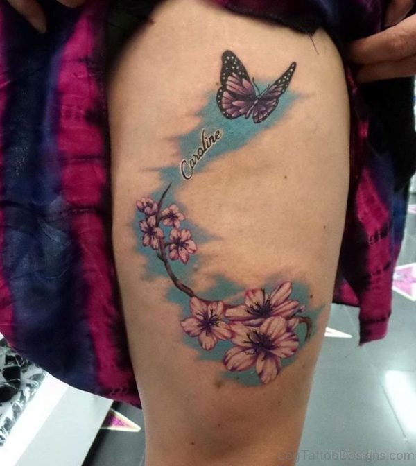 Butterfly With Flowers Tattoo On Thigh