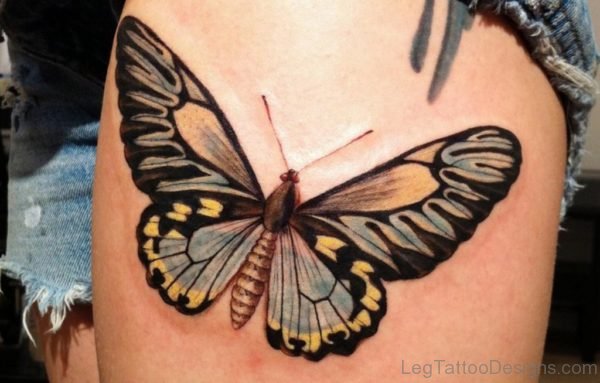 Colored Butterfly Tattoo On Thigh