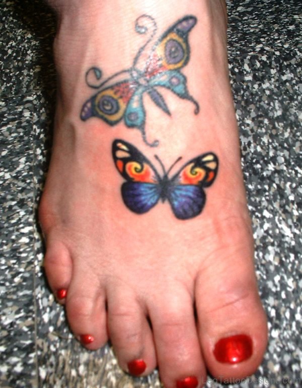 Colorful Butterlies Tattoo On Foot