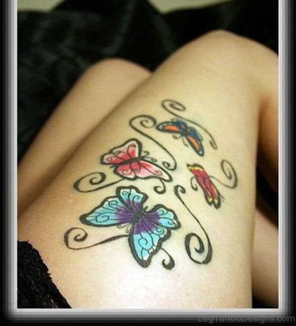 Colorful Lovely Butterflies Tattoo On Thigh
