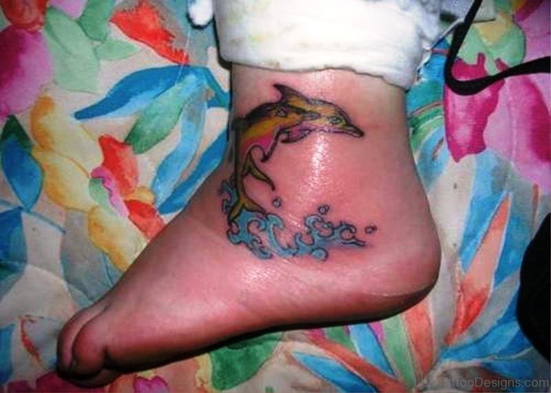 Colorful Two Dolphins Tattoo On Foot