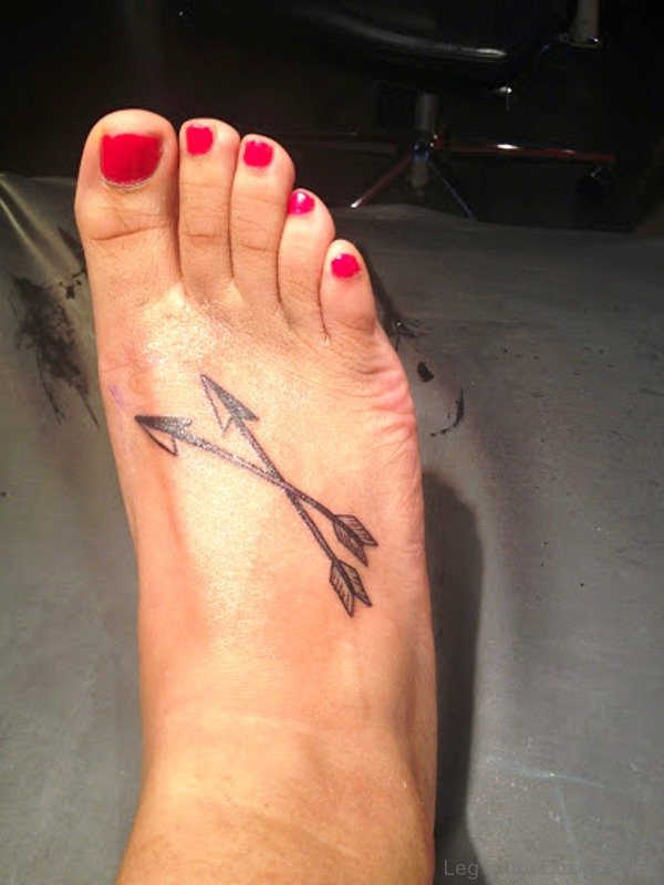 Cross Arrows Tattoo On Foot