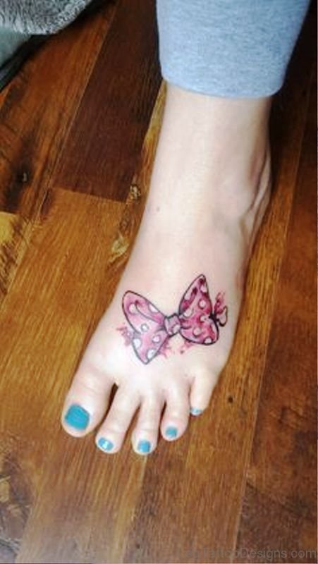 Cute Bow Tattoo On Foot