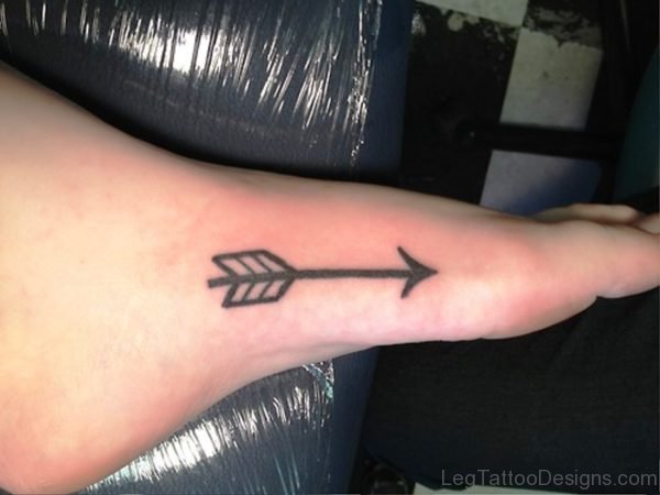 Dark Black Arrow Tattoo On Foot