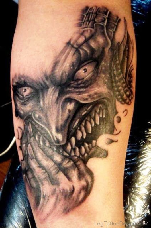 Dazzling Evil Tattoo On Leg