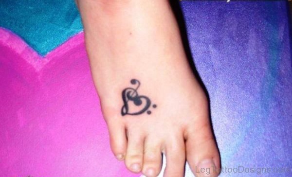 Dazzling Music Heart Tattoo On Foot