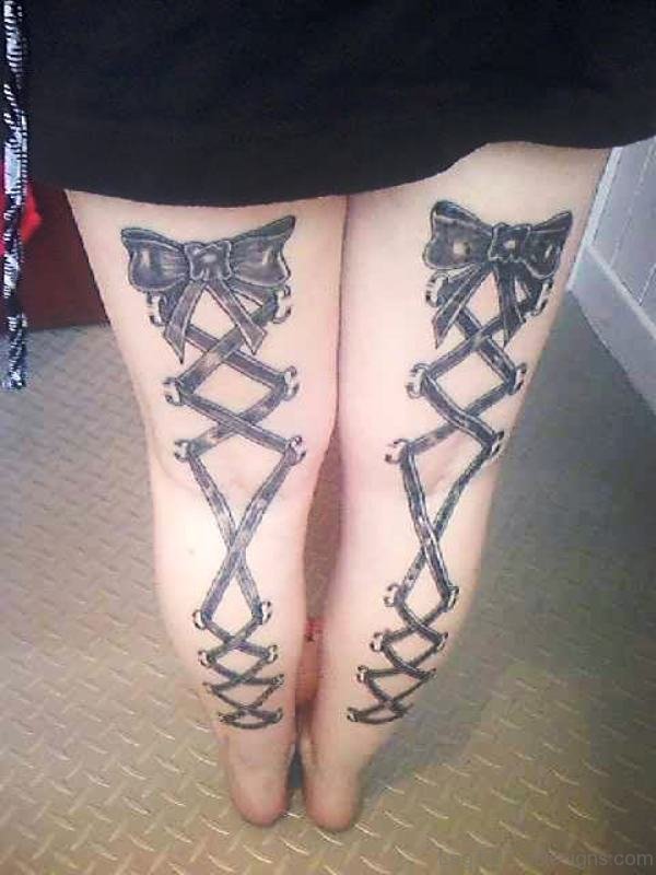 Delighful Corset Tattoo On Both Legs