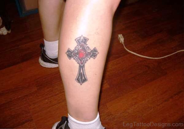 Delightful Cross Tattoo On Leg