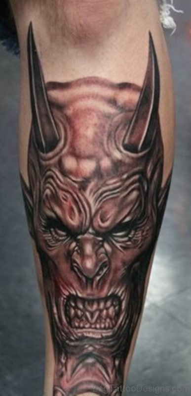 Demon Face Portrait Tattoo On Leg