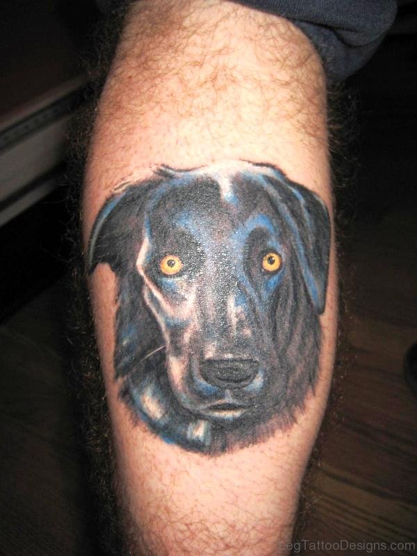 Dog Face Tattoo On Calf