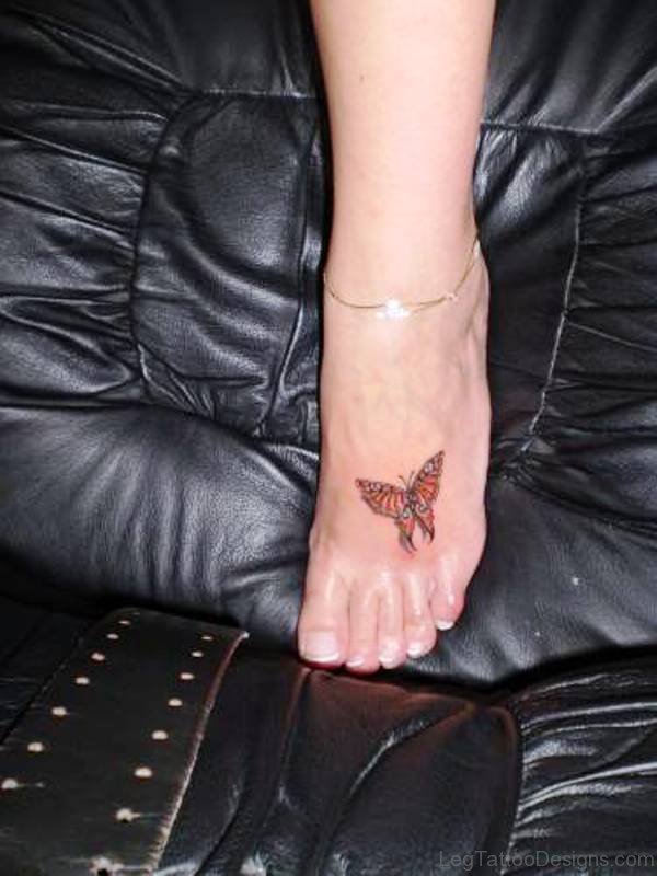 Elegant Butterfly Tattoo Design On Foot