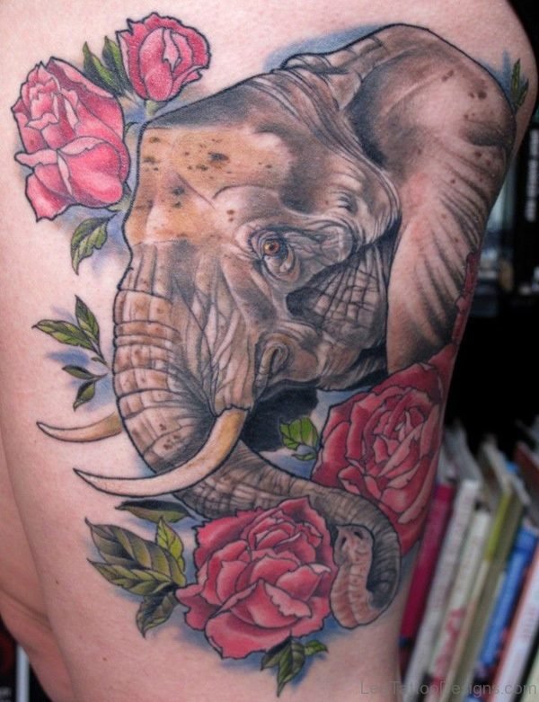 Elephnat And Flower Tattoo On Thigh