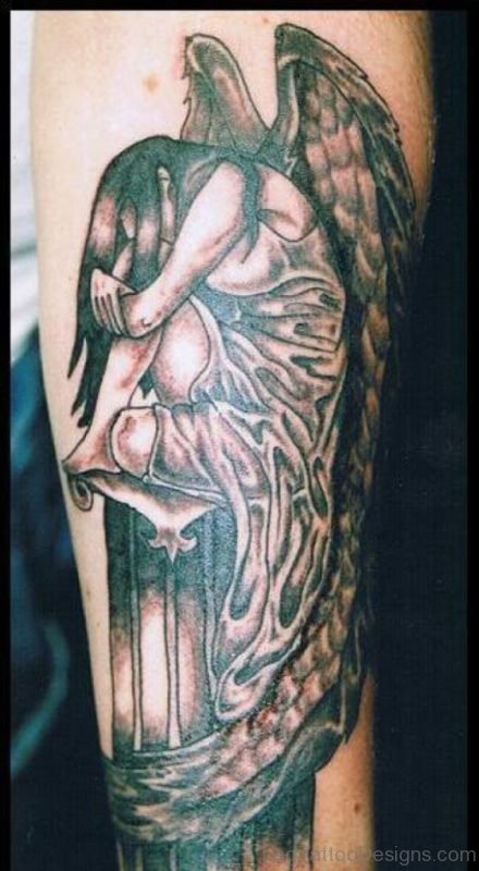 Fallen Angel Tattoo On Leg